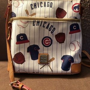 Dooney and Bourke cross body Chicago Cubs logo.